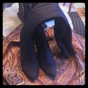 Thigh high cloth boot.